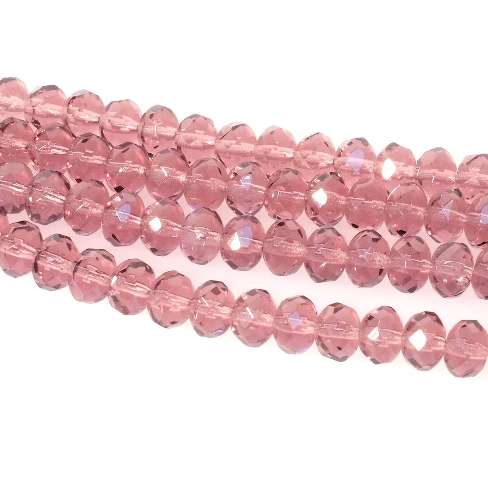 Fil de perles de Bohème transparentes lie de vin facettées 6x8mm.