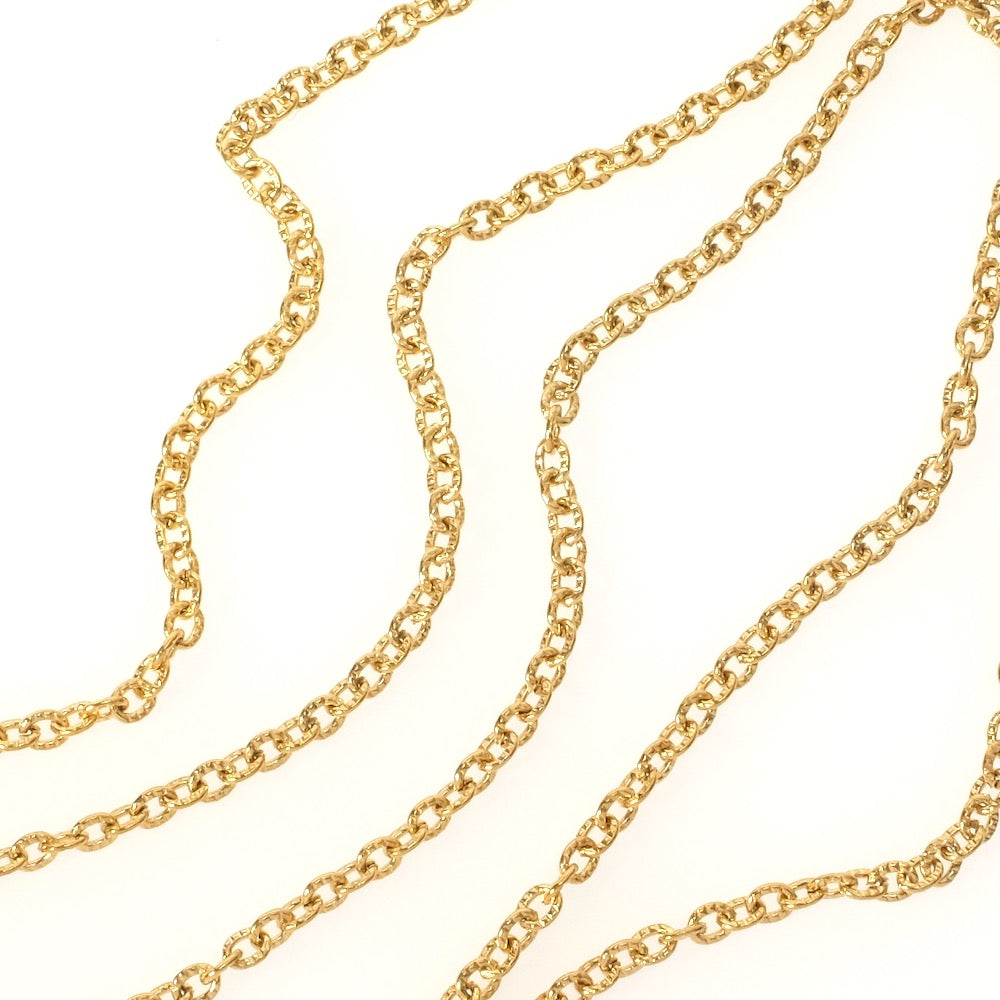 Bobine de chaîne ronde striée dorée en acier inoxydable.