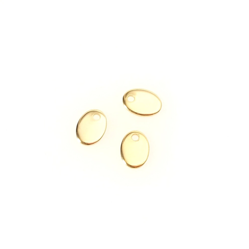 Quatre pendentifs ovales dorés en acier inoxydable 304.