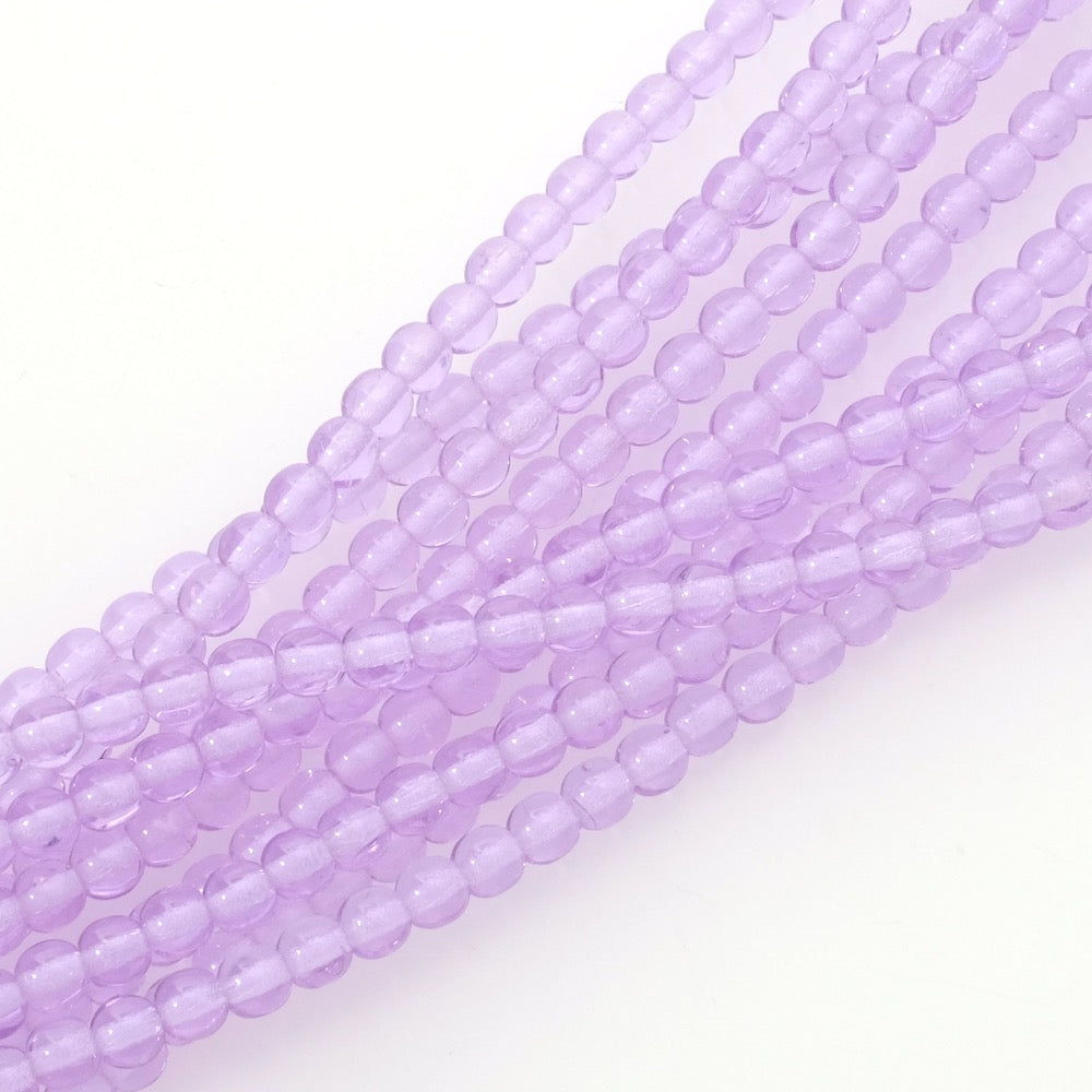 Fil de perles rondes violettes transparentes de 4mm.