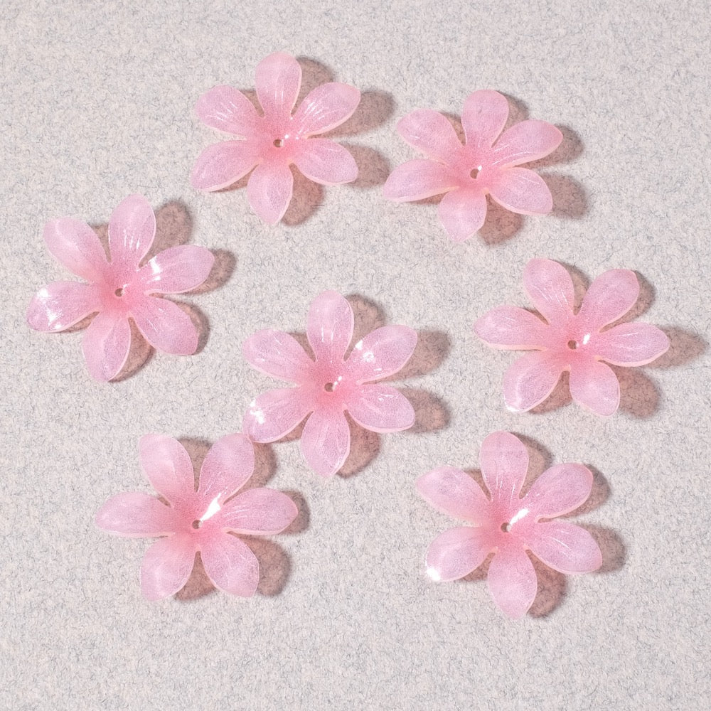 Coupelle fleur en acrylique rose poudré à six pétales.