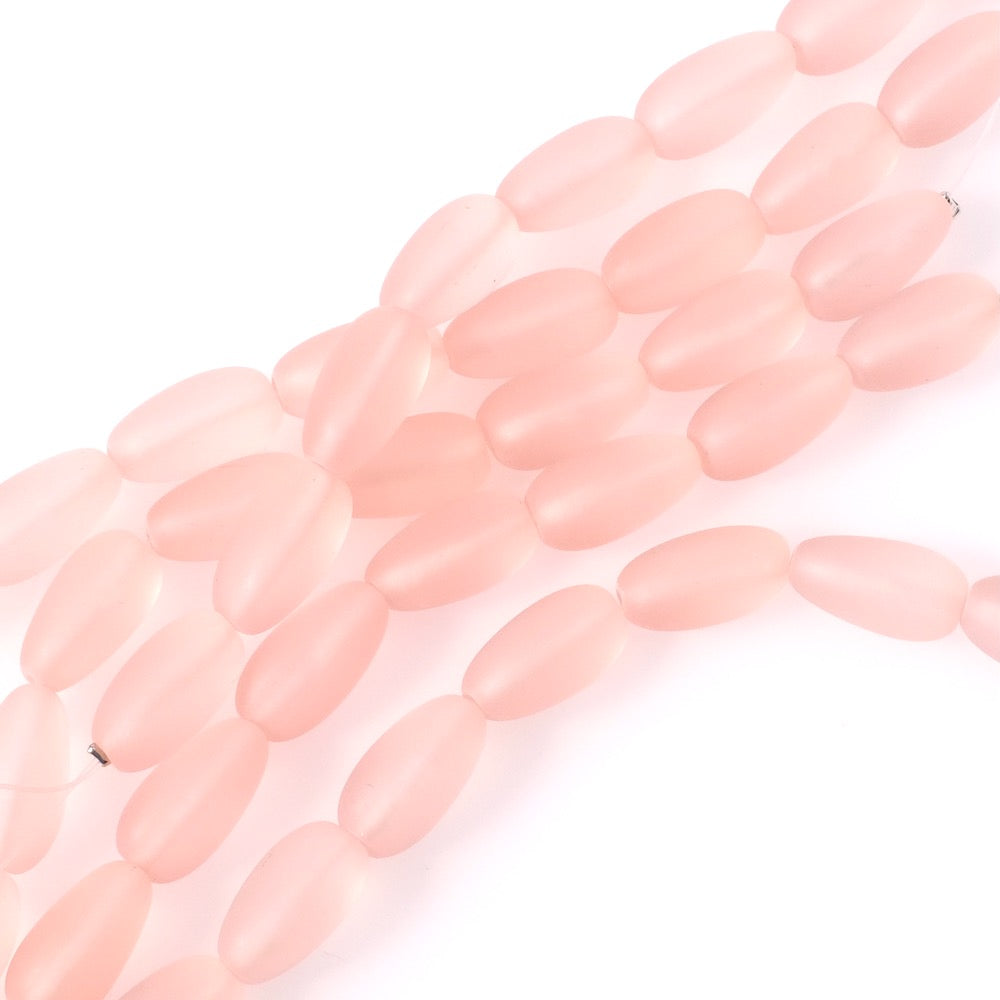 Fil de perles ovales twistées rose semi opaque de 15x7mm.