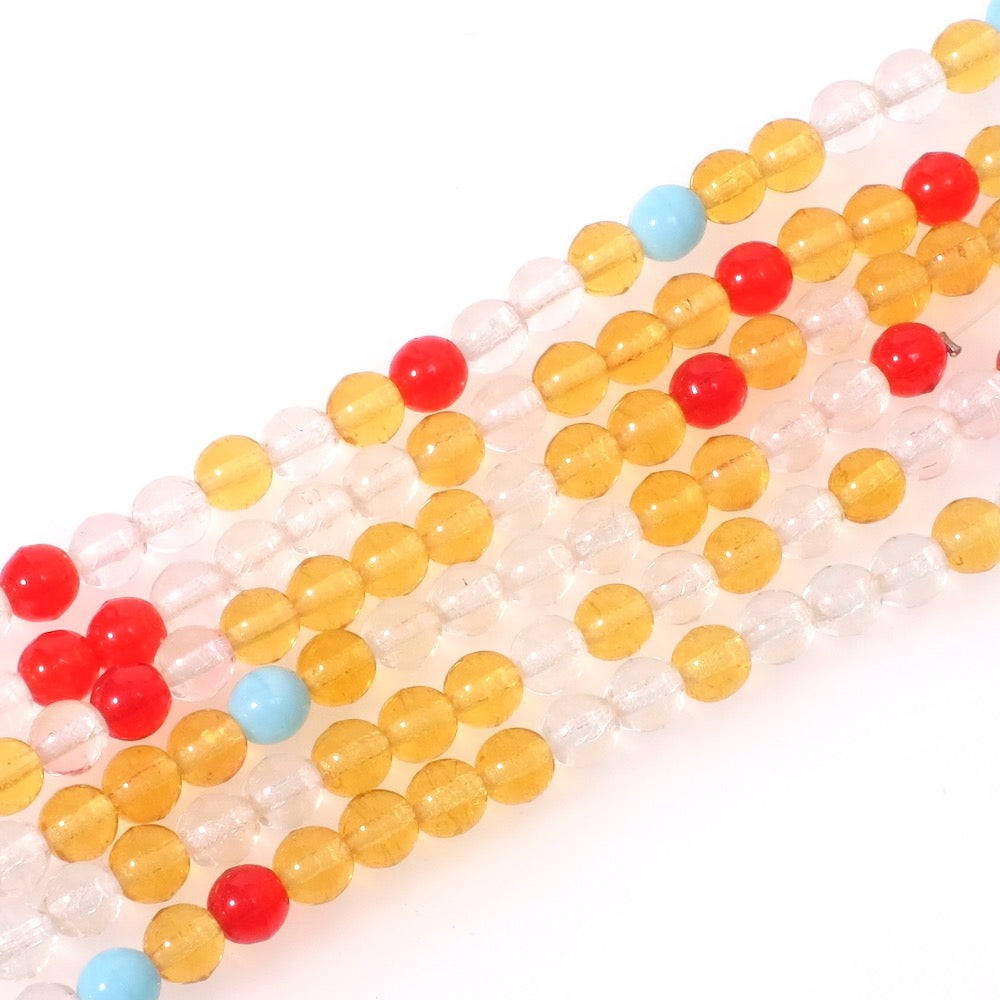 Fil de perles rondes 6mm en verre transparent, jaune, rouge et bleu clair.