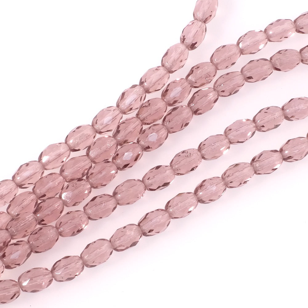 Fil de perles de Bohème olives facettées 8x6mm violet transparent.