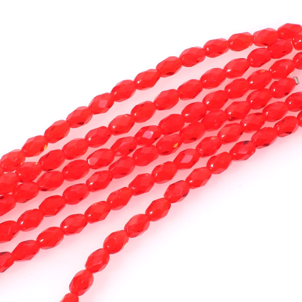Fil de perles de Bohème olives facettées 7x5mm rouge transparent.