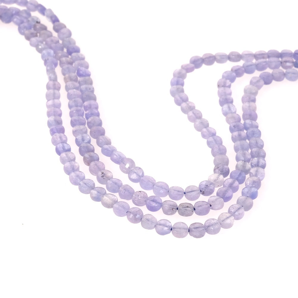 6 perles naturelles rondes aplaties facettées 4mm en Tanzanite