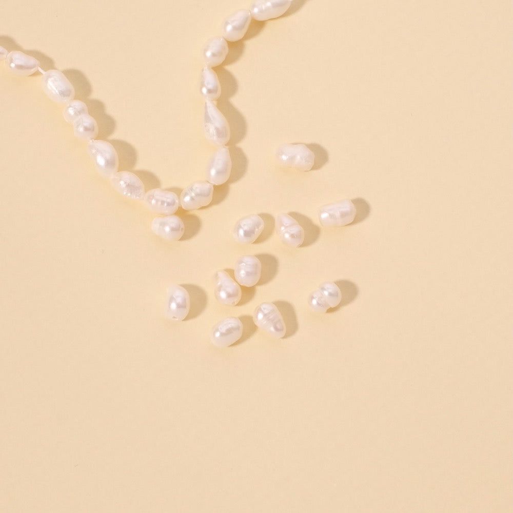 10 perles ovales 6mm irrégulières de Nacre naturelle