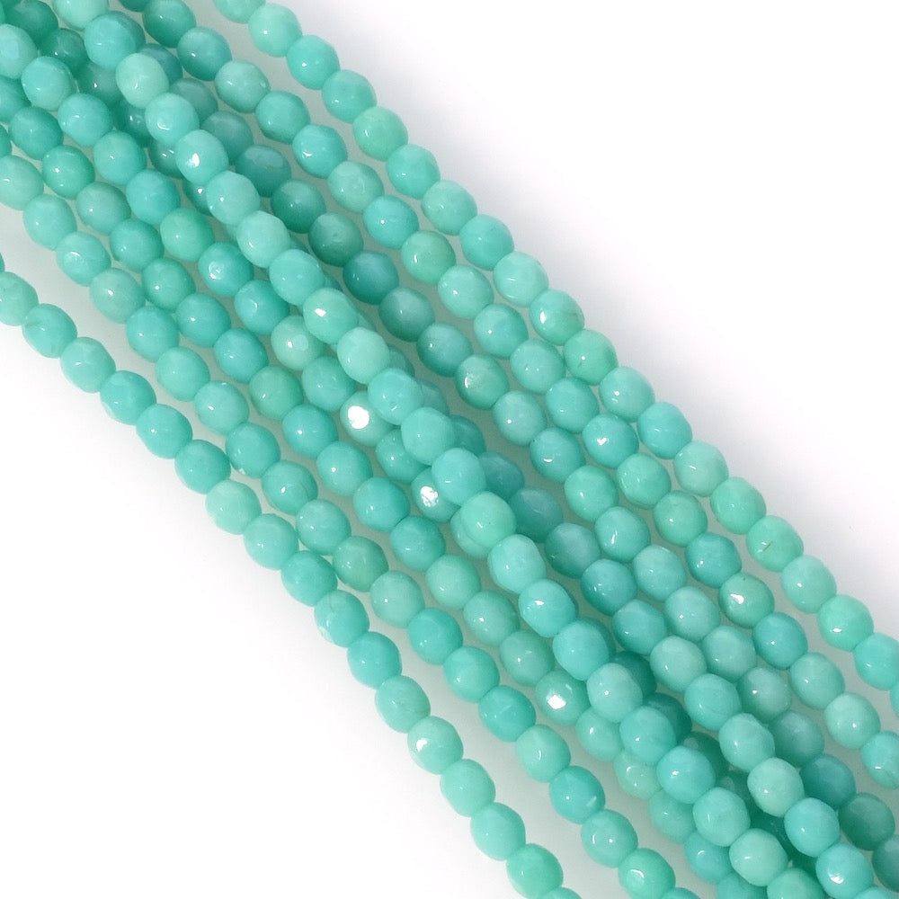 Fil de perles de Bohème rondes facettées 4mm turquoise opaque