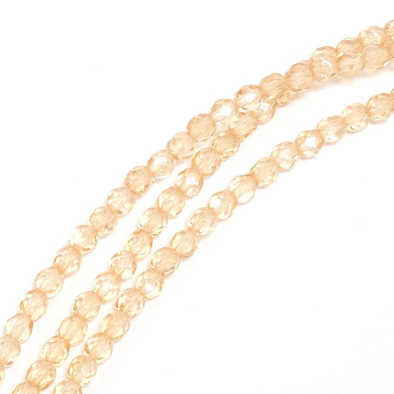 Fil de perles rondes facettées beige transparent 4mm