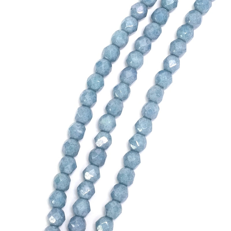 Fil de perles rondes facettées bleu métallique 4mm