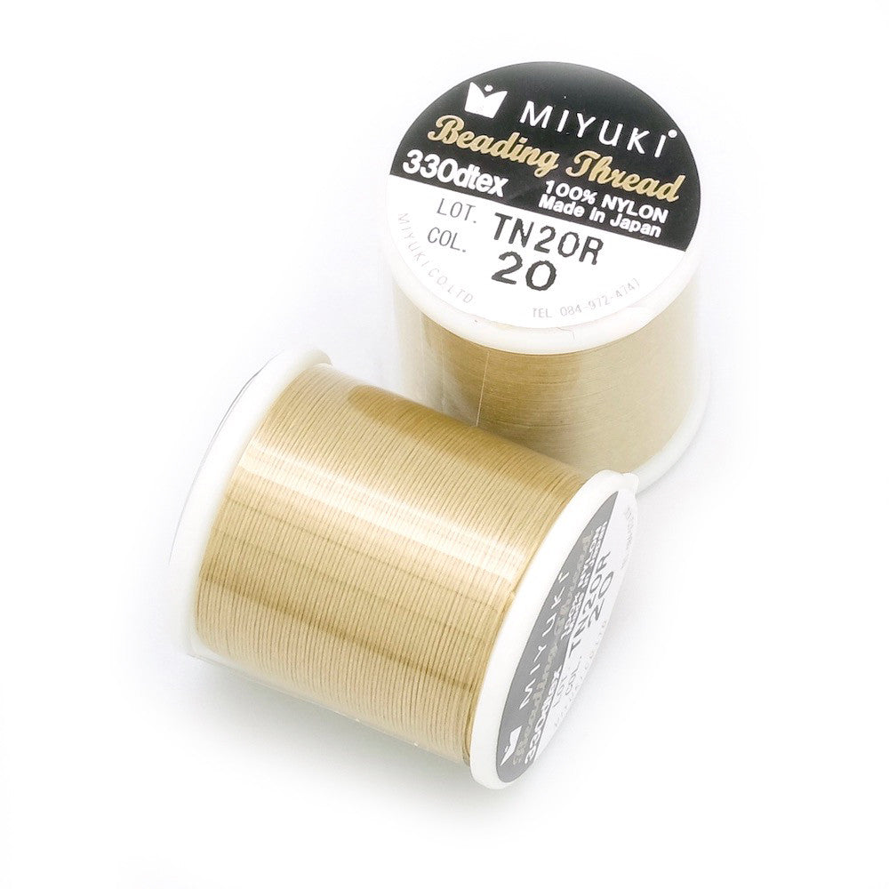 Bobine de fil nylon Miyuki Beading thread couleur semolina, 0,25mm.