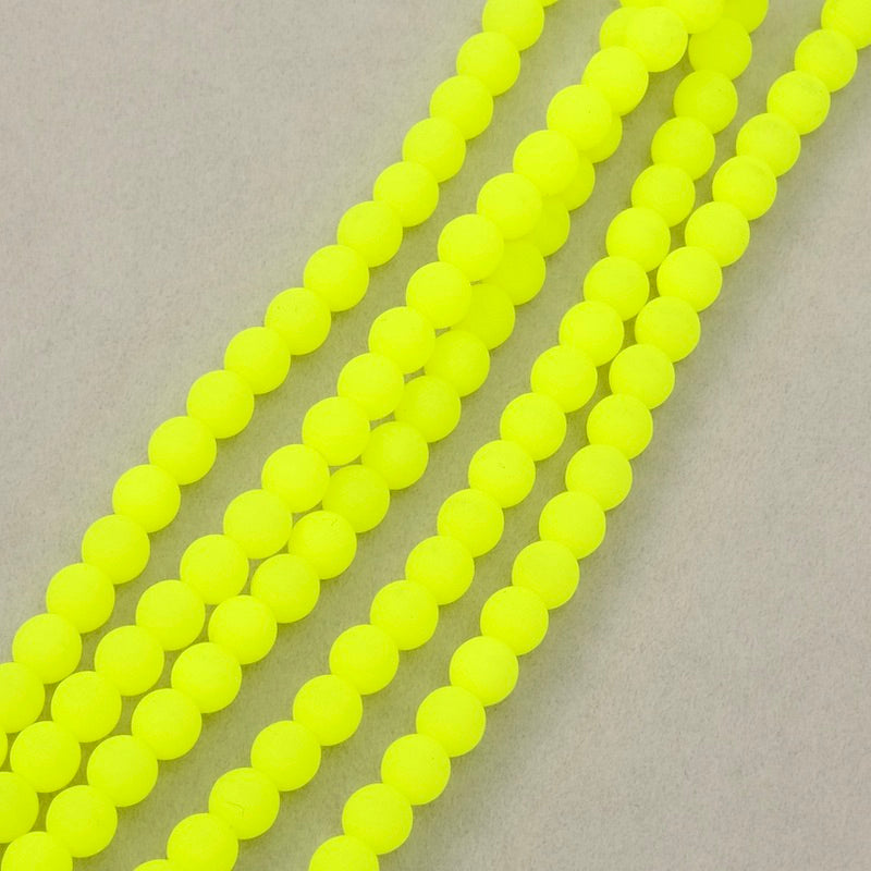 Fil de perles rondes 4mm jaune fluo opaque.