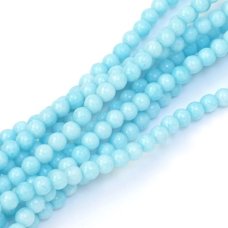Fil de perles rondes bleu clair opaque de 4mm.