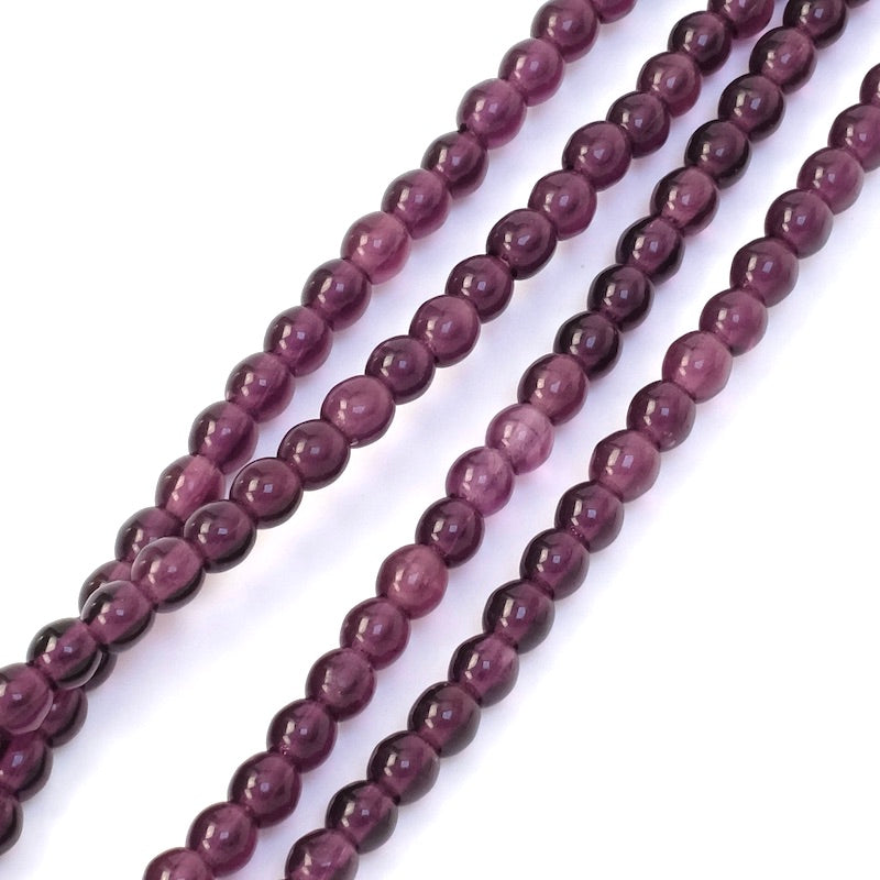 Fil de perles rondes en verre violet foncé de 4mm.