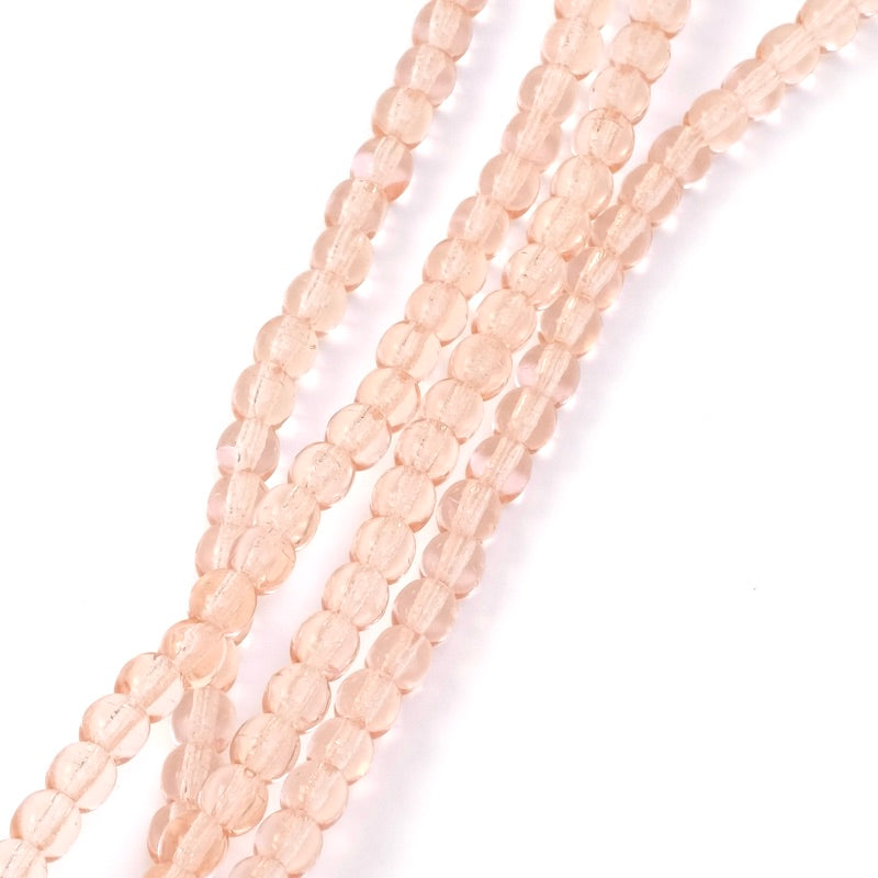 Fil de perles rondes en verre transparent pêche de 4mm.