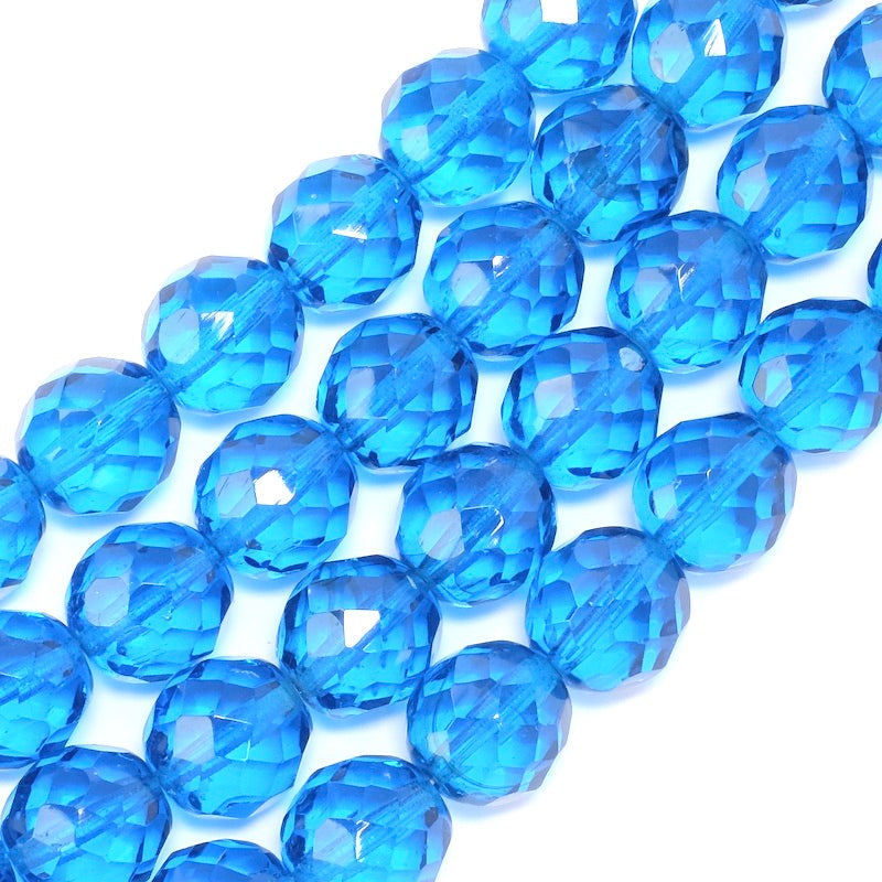 Fil de perles rondes facettées bleu foncé de 12mm.