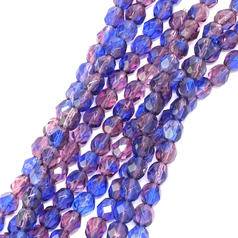 Fil de perles rondes facettées bleues et violettes foncées.