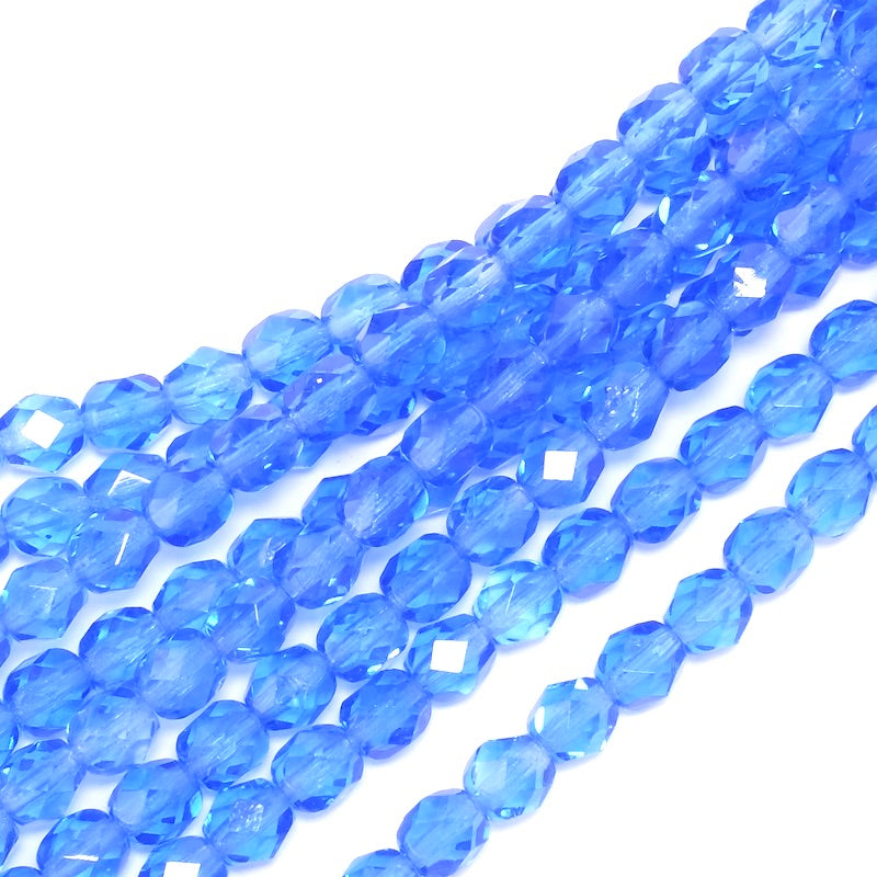 Fil de perles rondes facettées bleu foncé transparent de 6mm.