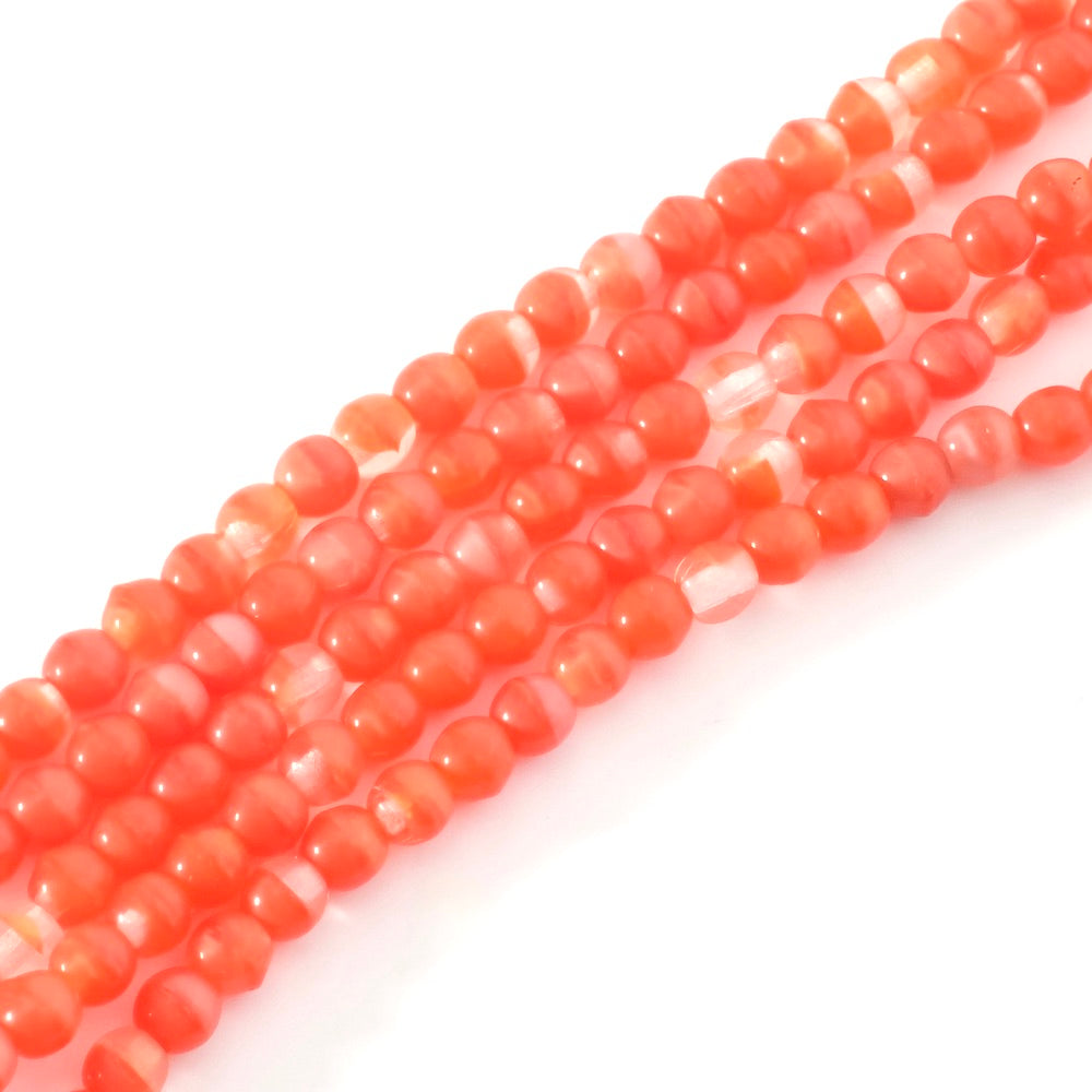 Fil de perles rondes 4mm en verre, nuances rouge orangé.