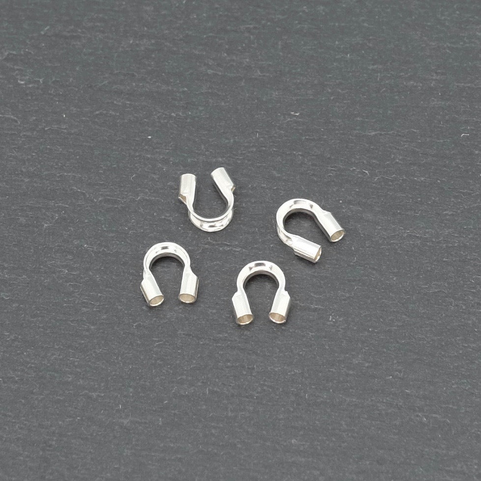 4 protège fil en argent massif 925.