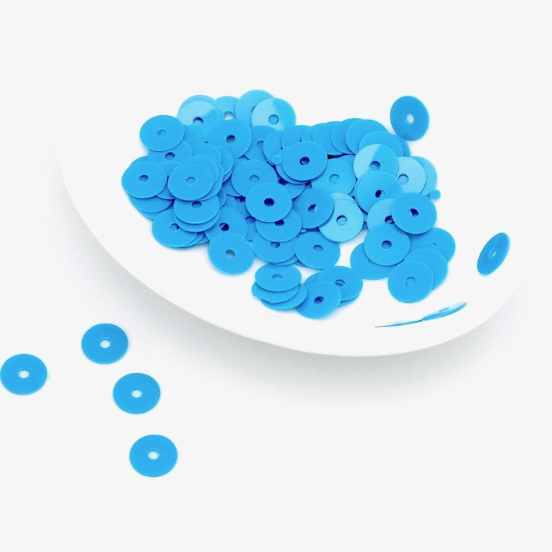 Lot de 8 grammes de sequins pastilles Heishi en acrylique bleu canard.