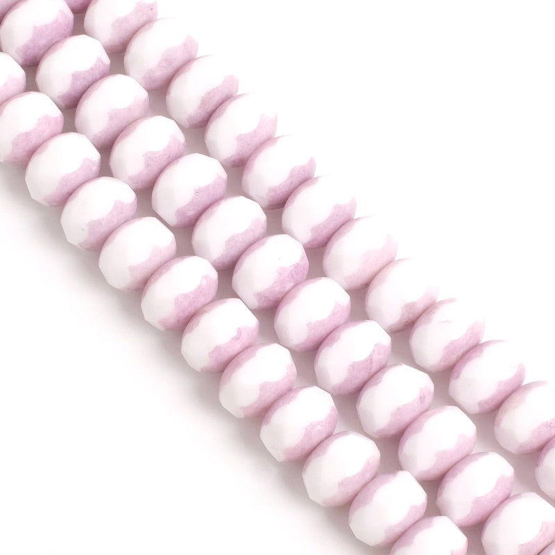 Fil de perles facettées blanc parme opaque 6x8mm.