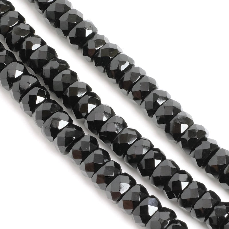 Fil de perles rondelles facettées noires opaques 3x6mm.