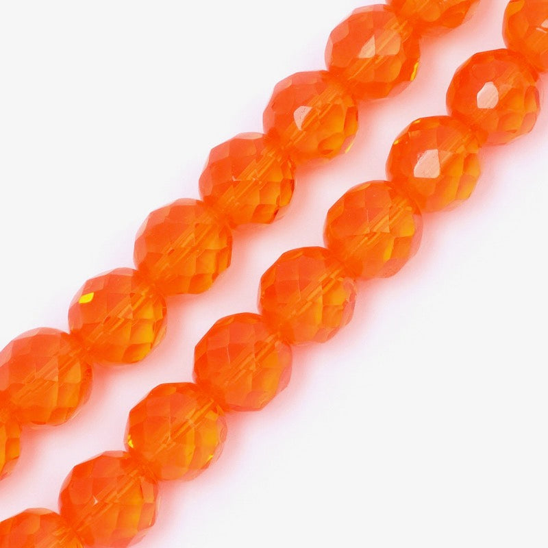 Fil de 12 perles rondes facettées orange transparent de 10mm.