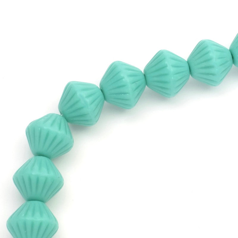 Fil de perles toupie striée turquoise.