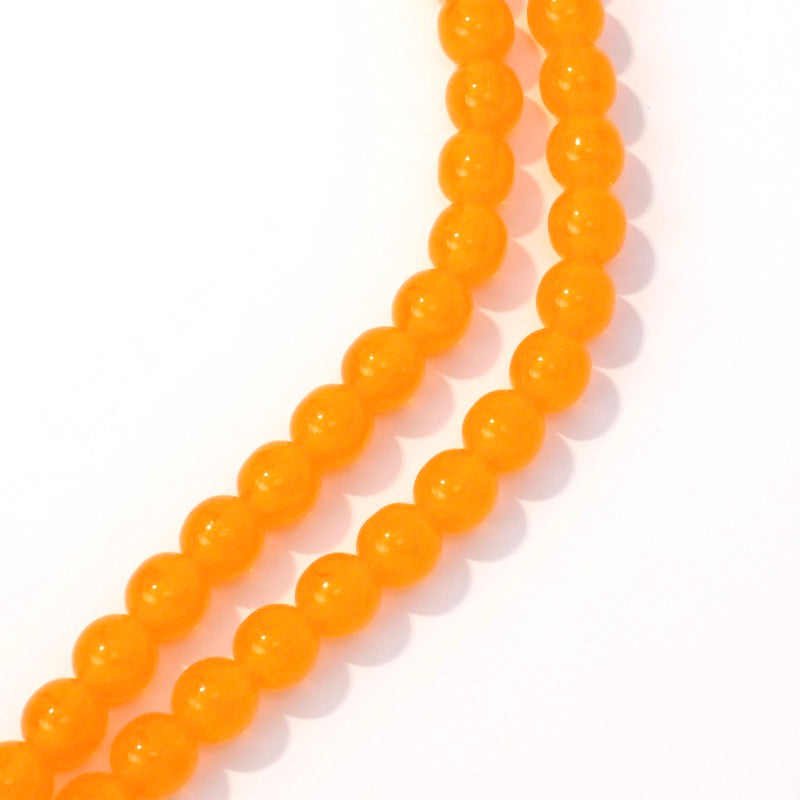 Fil de perles rondes en verre orange transparent de 6mm.