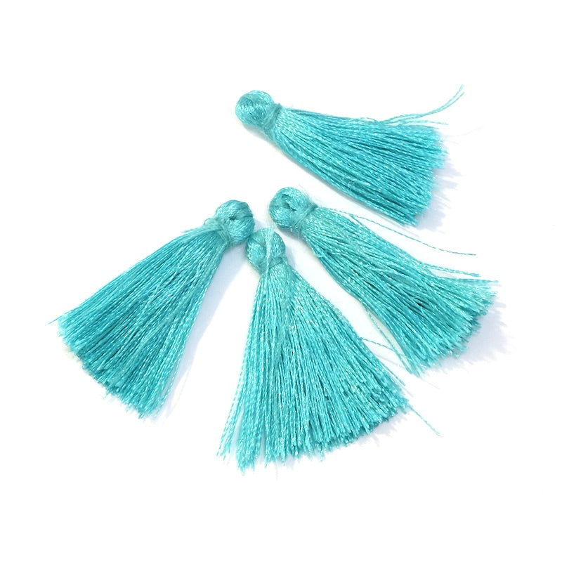6 Pompons en polyester 30mm Turquoise