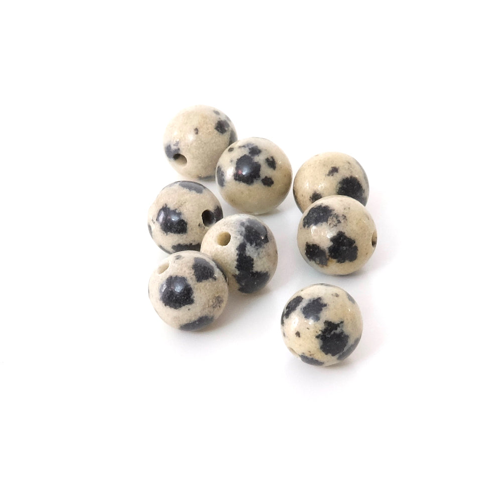 8 perles rondes en Jaspe Dalmatien naturel de 6mm.