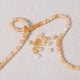 Dix perles rondes facettées de 4 mm en citrine naturelle dégradé jaune miel.