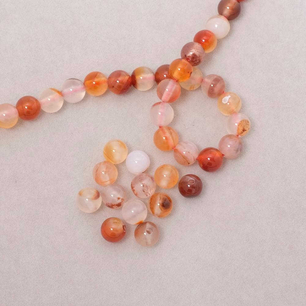 Fil de perles en pierres naturelles ronde 6mm en Agate