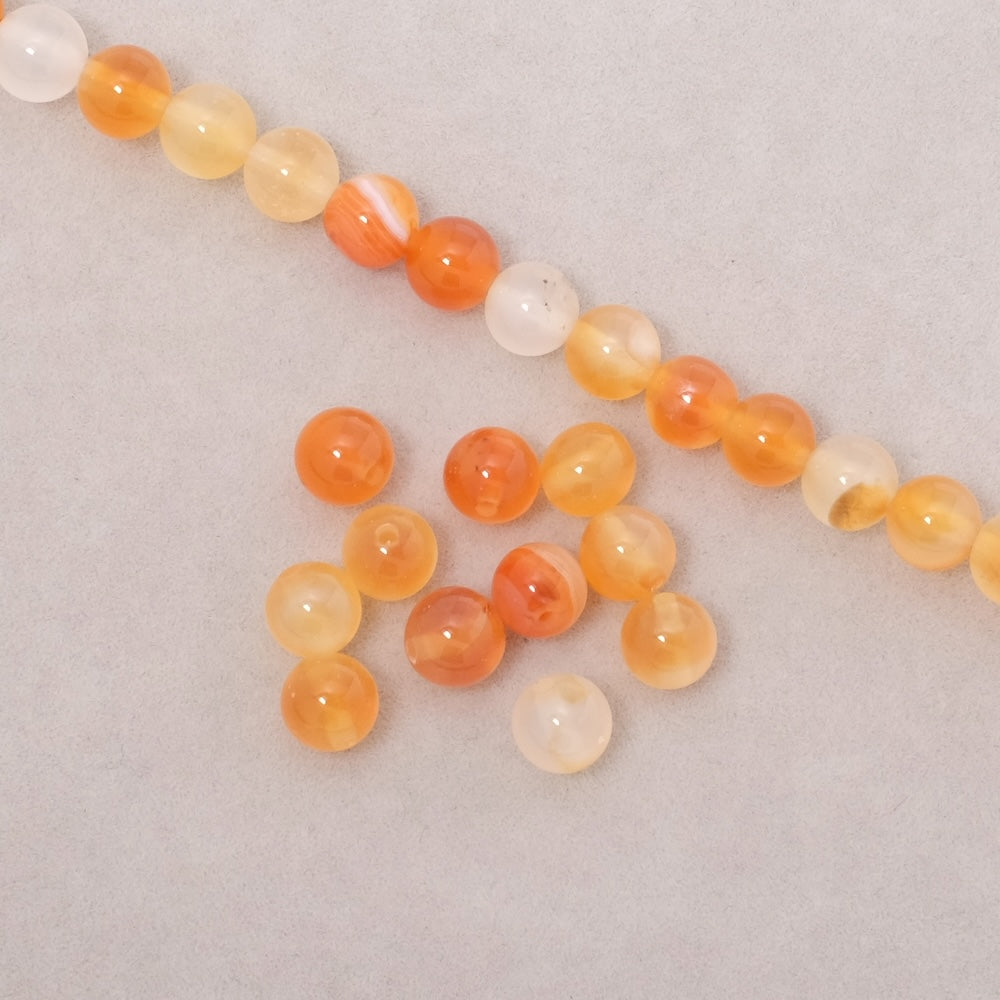 Fil de perles naturelles rondes 6mm en Cornaline