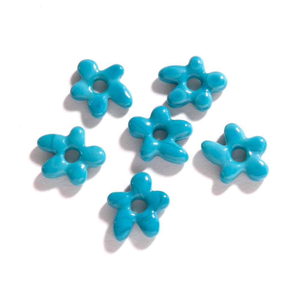 2 Pendentifs fleur asymétrique — verre bleu persan
