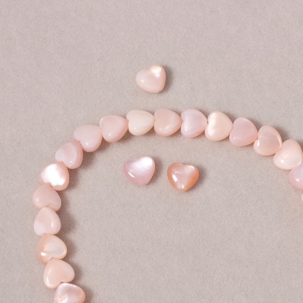 2 perles coeur 6mm en Nacre rose très belle qualité
