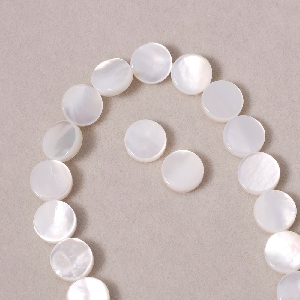 2 perles palet rond 8mm en Nacre blanche très belle qualité
