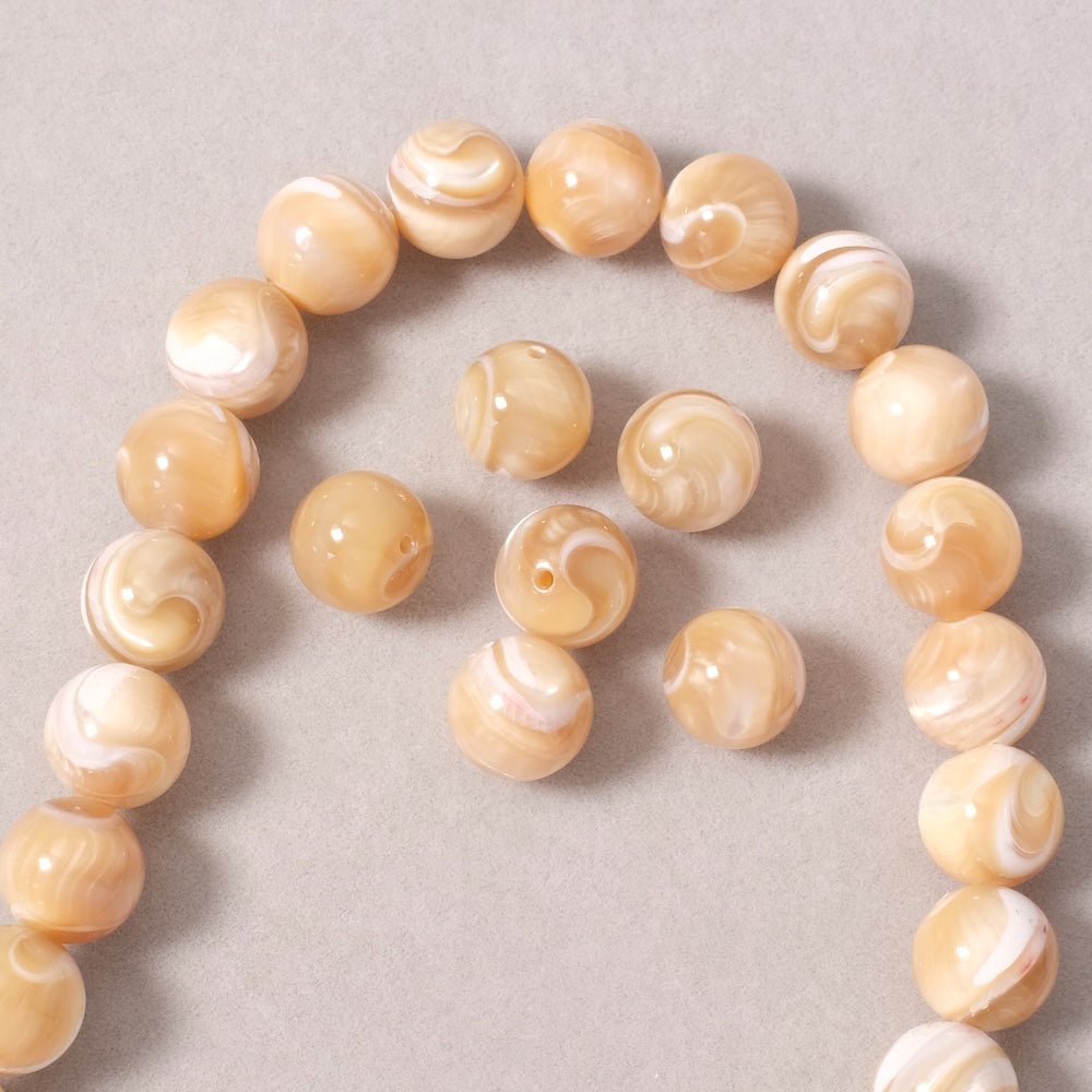 4 perles rondes 10mm en Nacre naturelle beige