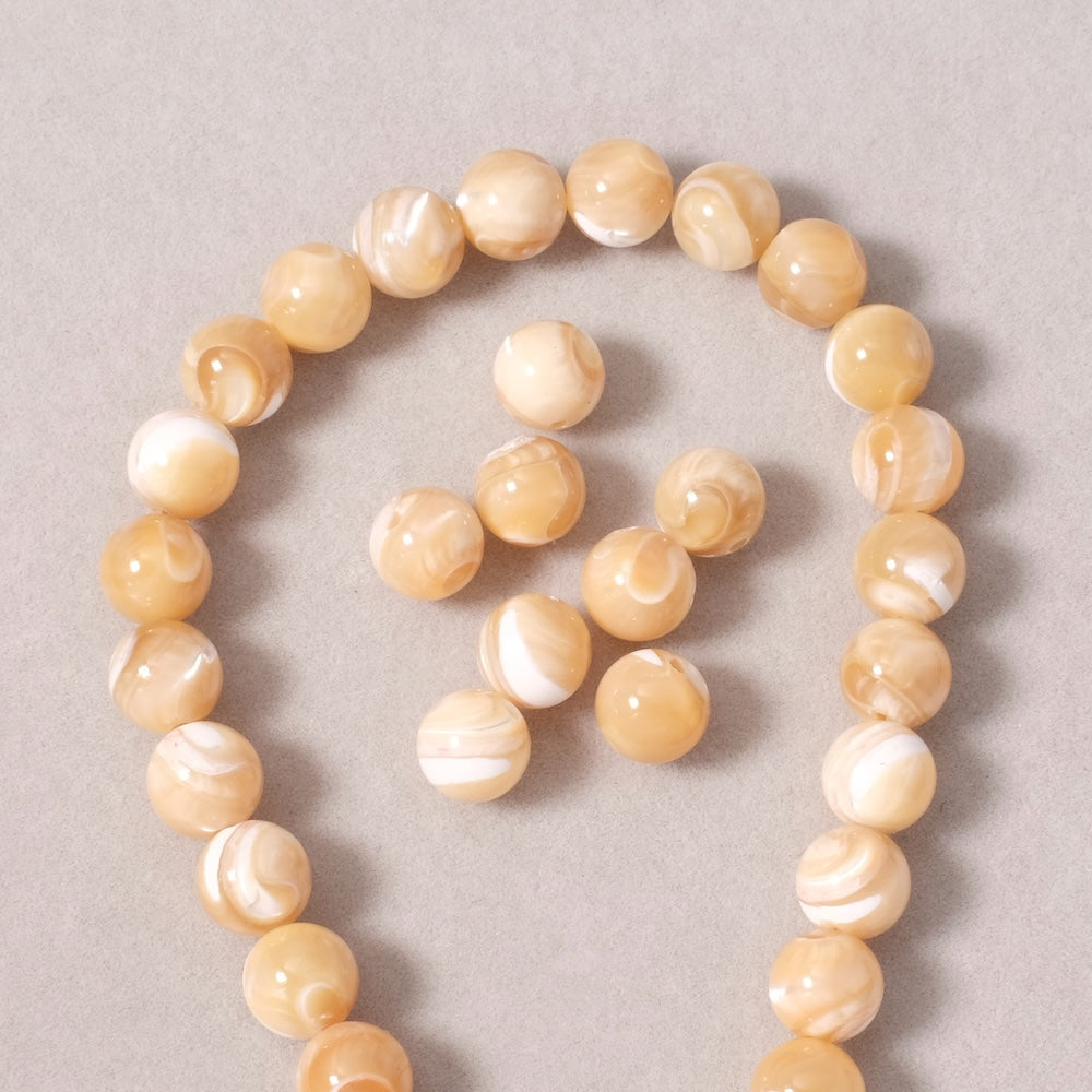 6 perles rondes 8mm en Nacre naturelle beige