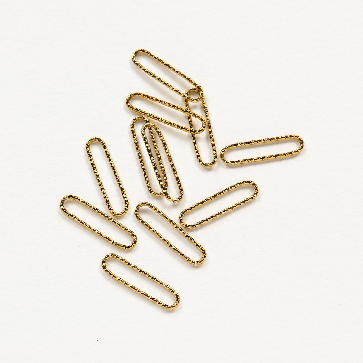 Anneaux ovales 20 x 5 mm texture diamantée en acier inoxydable doré 18K