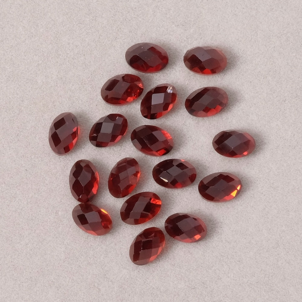 Cabochon en pierre naturelle Ovale facetté 6 x 4mm Grenat Almandin