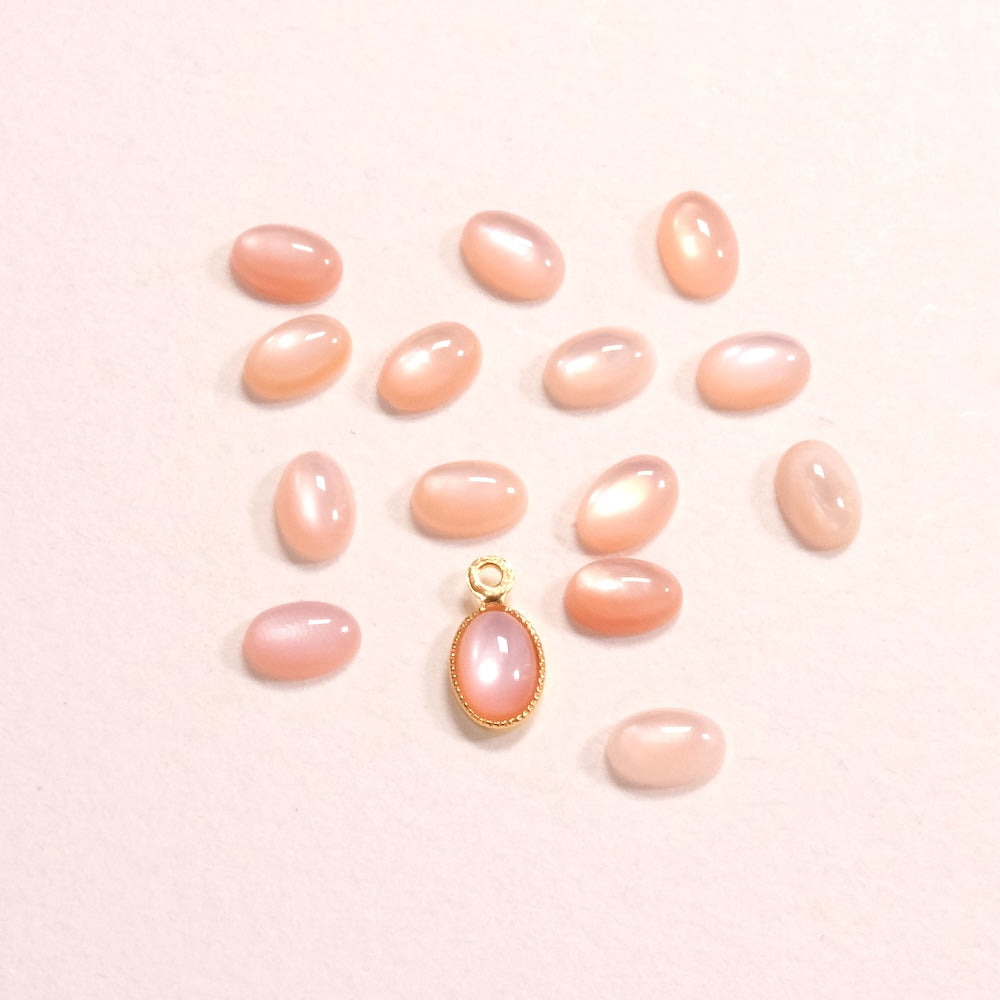 Cabochon ovale 6 × 4 mm — nacre rose