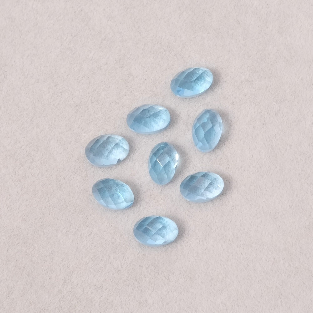 Cabochon pierre naturelle Ovale facetté 6 x 4mm Topaze Swiss Blue