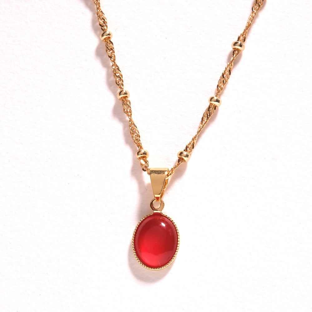 Collier avec pendentif Onyx rouge doré sur chaîne fine