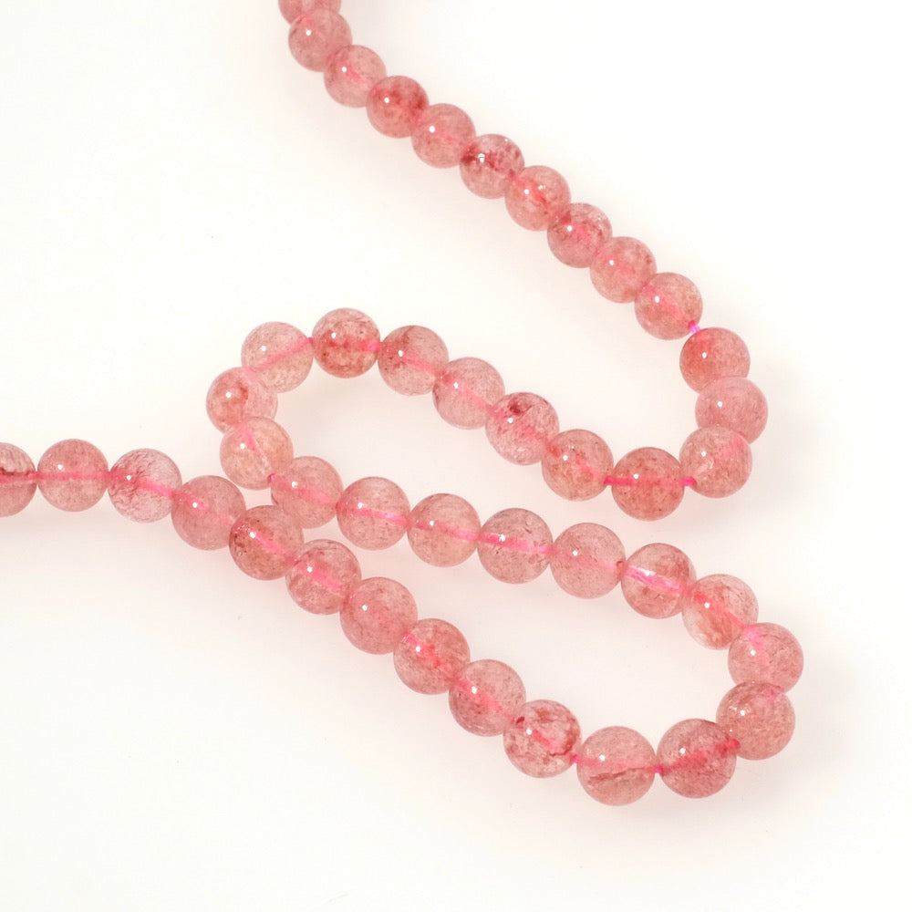 Fil de perles naturelles rondes 6mm en Quartz fraise