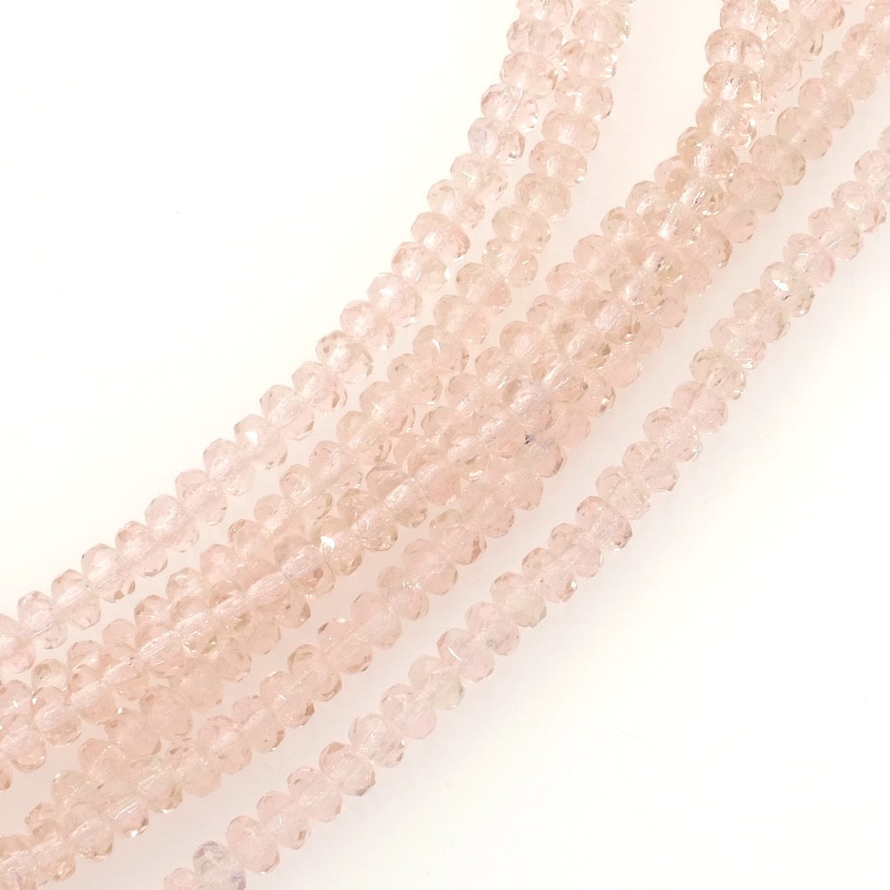 Fil de perles de Bohème Donuts facetté 2x3mm rose transparent