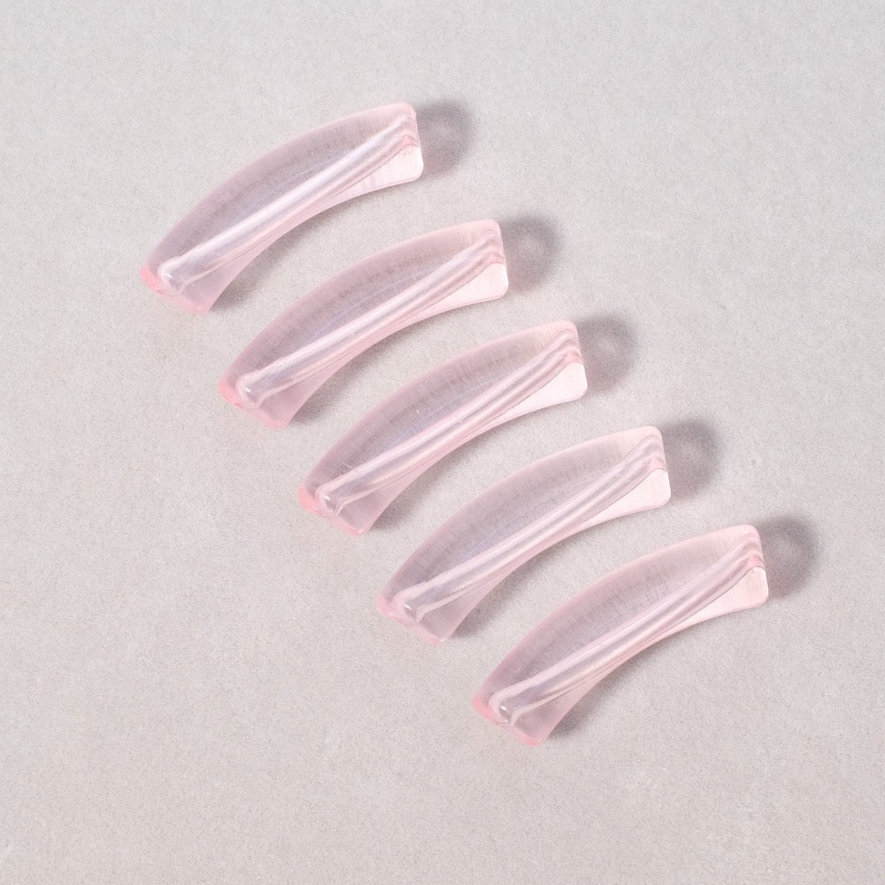Perle tube incurvée Diamètre 8mm en acrylique rose transparent