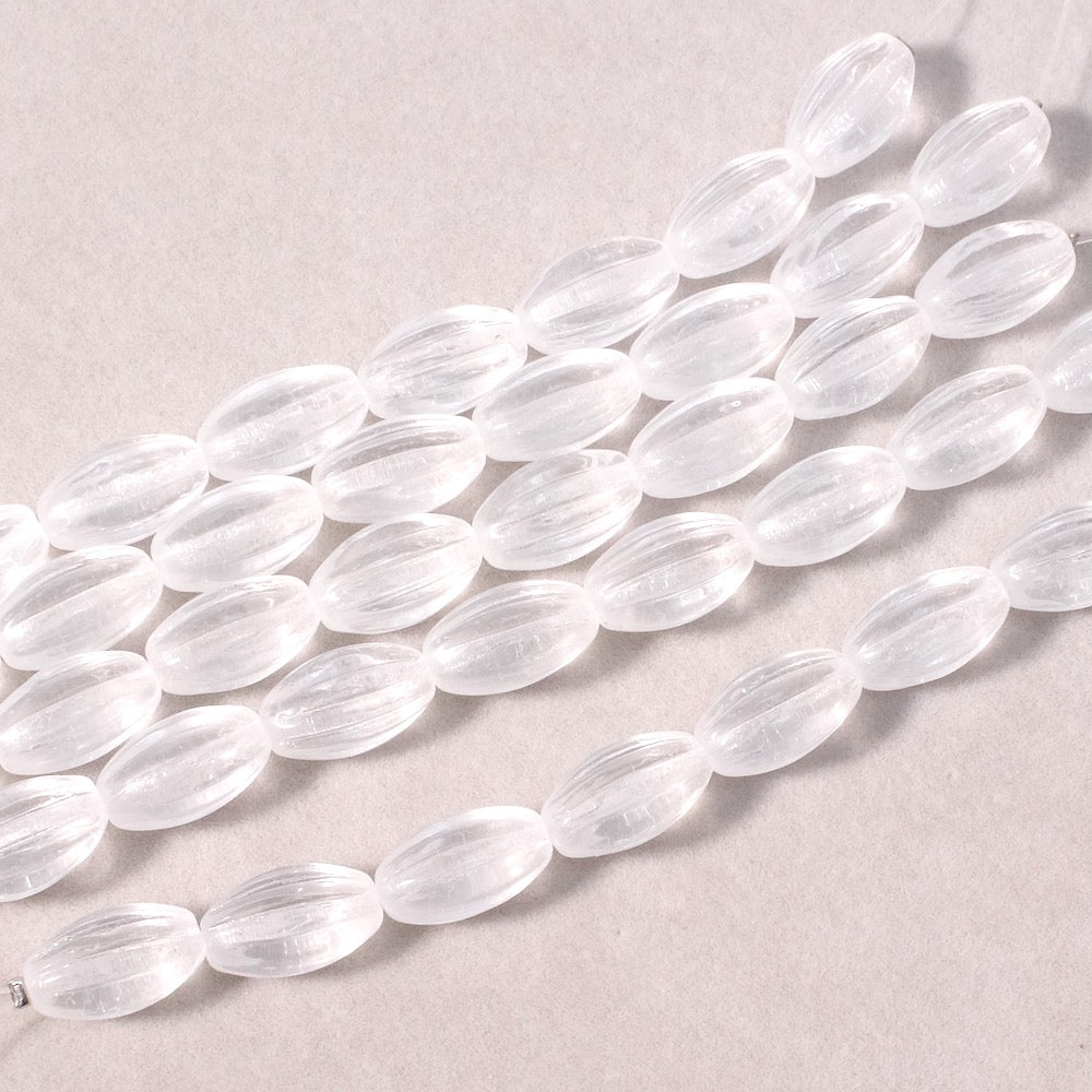Fil de perles de Bohème Olives striées 14x8mm transparent