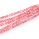 Fil de perles rondes facettées rose nuancé transparent de 5mm.